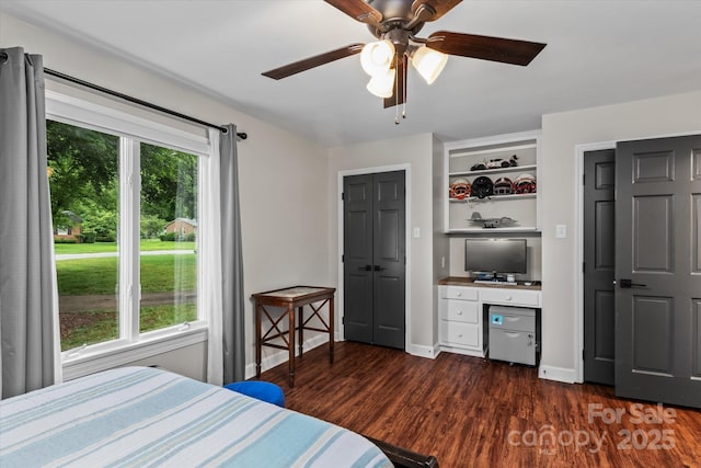 625 S Magnolia St, Mooresville, NC 28115 - bedroom featuring dark wood-style floors, baseboards, and a ceiling fan