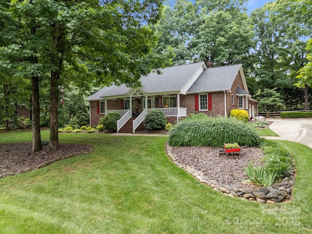 635 Timberlane Trl, Salisbury, NC 28147 - ranch-style house featuring brick siding, covered porch, a front lawn, a chimney, and concrete driveway