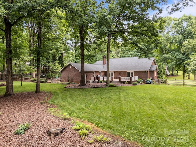 635 Timberlane Trl, Salisbury, NC 28147 - single story home featuring brick siding, a deck, and view of scattered trees