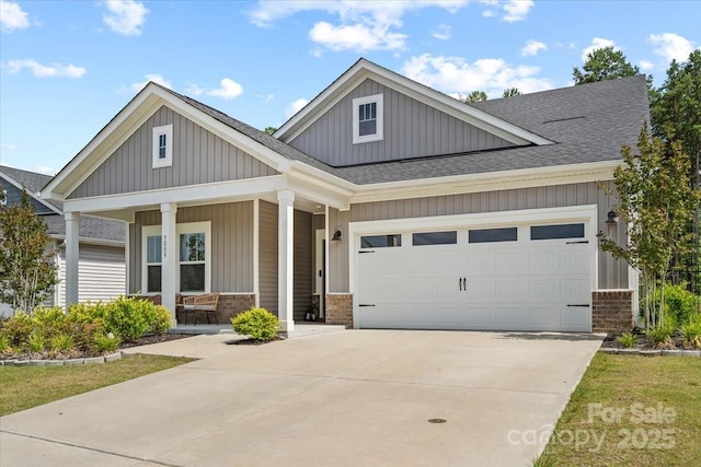 9009 Myrna Dr, Gastonia, NC 28056 - craftsman inspired home with roof with shingles, a porch, a garage, driveway, and brick siding