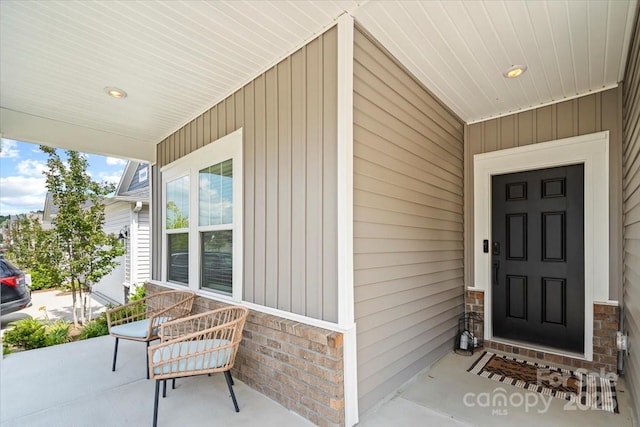 9009 Myrna Dr, Gastonia, NC 28056 - view of exterior entry with a porch