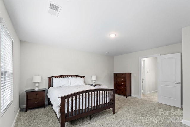 9009 Myrna Dr, Gastonia, NC 28056 - carpeted bedroom featuring multiple windows