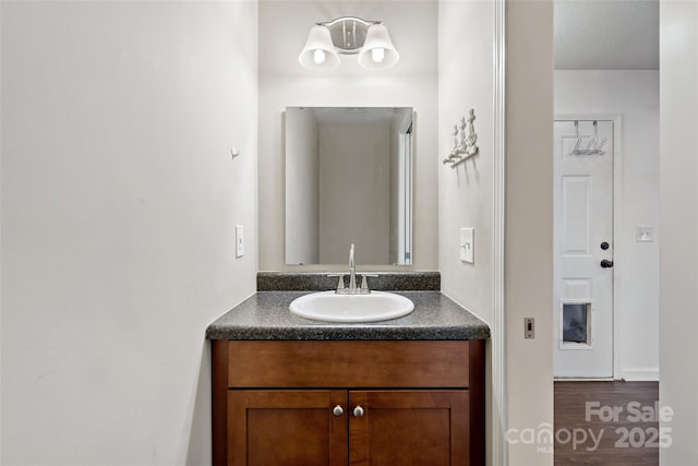 31 English Ivy Rd, Asheville, NC 28806 - bathroom featuring vanity and wood finished floors