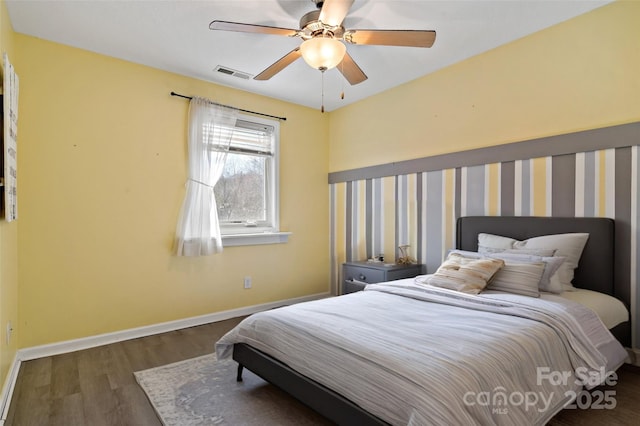 31 English Ivy Rd, Asheville, NC 28806 - bedroom featuring wood finished floors, baseboards, and ceiling fan