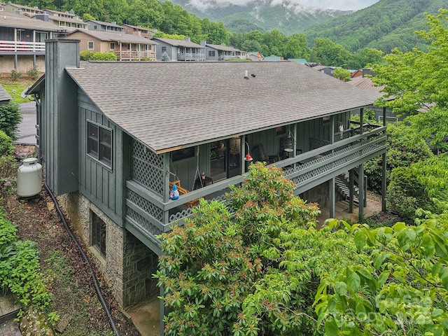418 Stoney Ridge Loop, Maggie Valley, NC 28751 - back of house featuring roof with shingles, board and batten siding, a mountain view, and stairway