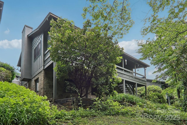 418 Stoney Ridge Loop, Maggie Valley, NC 28751 - view of side of property featuring stone siding