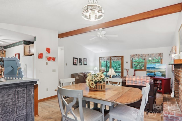 418 Stoney Ridge Loop, Maggie Valley, NC 28751 - dining room with beam ceiling, a ceiling fan, light wood-style floors, baseboards, and a chandelier