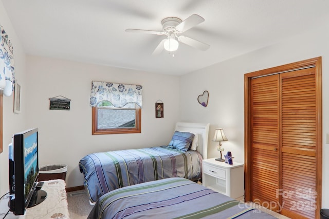418 Stoney Ridge Loop, Maggie Valley, NC 28751 - bedroom with a closet, ceiling fan, carpet floors, and baseboards