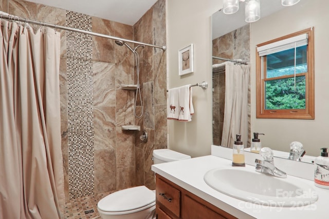 418 Stoney Ridge Loop, Maggie Valley, NC 28751 - full bathroom featuring toilet, vanity, and tiled shower