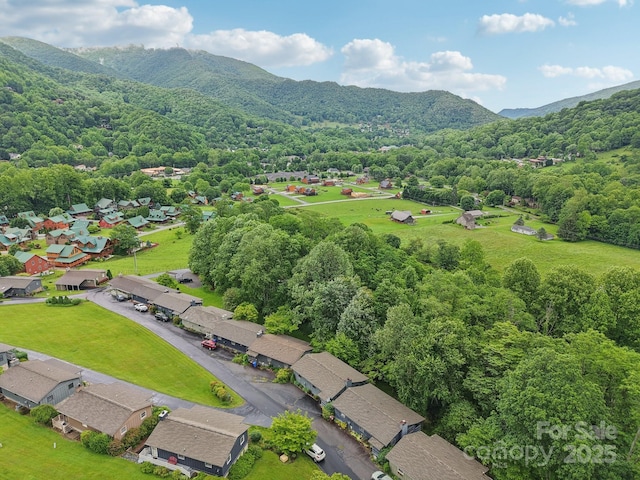 418 Stoney Ridge Loop, Maggie Valley, NC 28751 - aerial perspective of suburban area featuring a mountainous background and a heavily wooded area