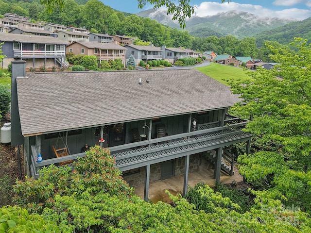 418 Stoney Ridge Loop, Maggie Valley, NC 28751 - back of house with roof with shingles, stairs, a deck with mountain view, and board and batten siding