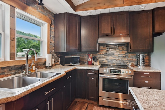72 Wakulla Dr, Maggie Valley, NC 28751 - kitchen with appliances with stainless steel finishes, under cabinet range hood, a sink, decorative backsplash, and light countertops