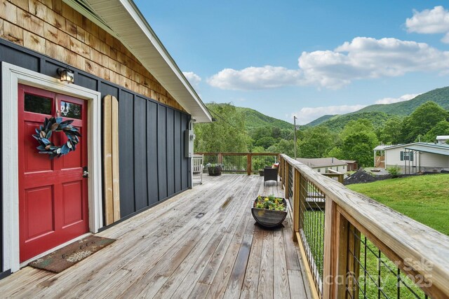 72 Wakulla Dr, Maggie Valley, NC 28751 - wooden terrace featuring a mountain view and a lawn