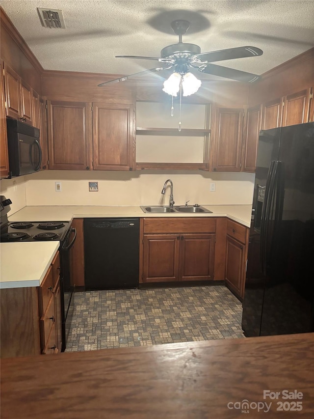 550 Camrose Cir NE, Concord, NC 28025 - kitchen with black appliances, a sink, ceiling fan, light countertops, and a textured ceiling