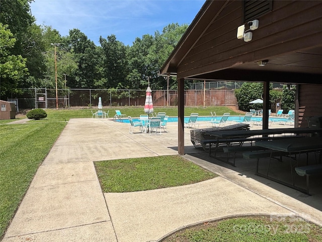550 Camrose Cir NE, Concord, NC 28025 - community pool featuring a patio area