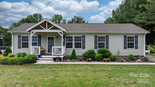 2843 Hopewell Church Rd, Sherrills Ford, NC 28673 - view of front of house featuring a porch, a front yard, and a shingled roof