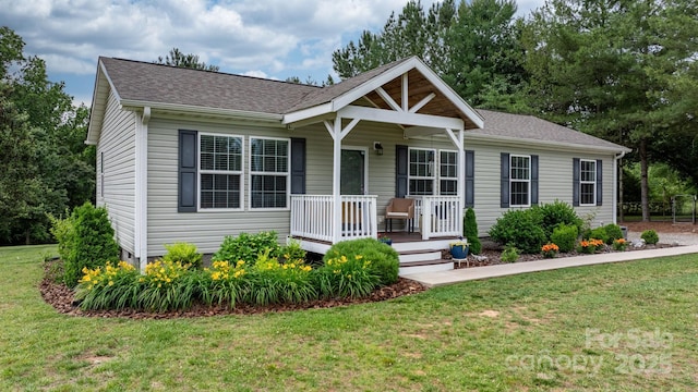 2843 Hopewell Church Rd, Sherrills Ford, NC 28673 - view of front facade featuring covered porch, a front lawn, and a shingled roof