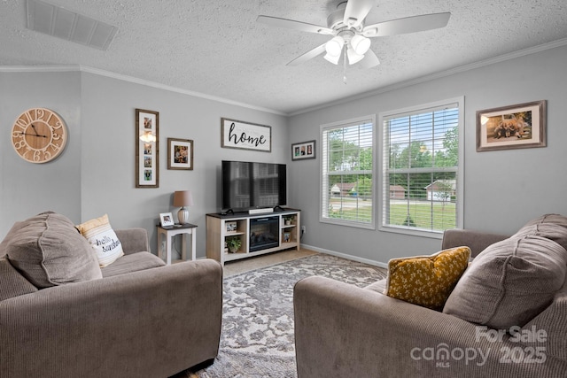 2843 Hopewell Church Rd, Sherrills Ford, NC 28673 - living area featuring a textured ceiling, carpet flooring, ceiling fan, ornamental molding, and baseboards