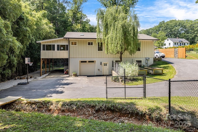 506 Hiawassee Ave, Black Mountain, NC 28711 - view of front of house with driveway, a garage, and a carport