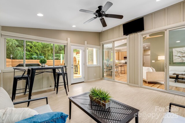 506 Hiawassee Ave, Black Mountain, NC 28711 - living room featuring plenty of natural light, ceiling fan, vaulted ceiling, light wood-style floors, and recessed lighting