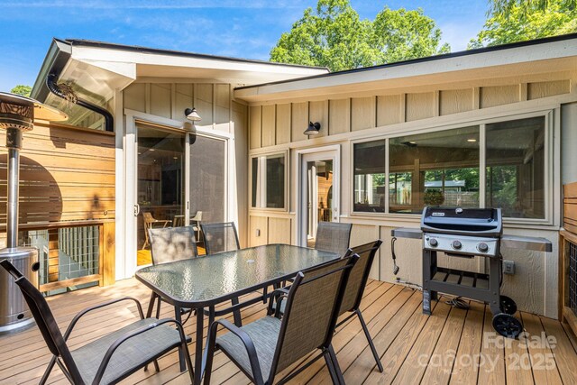 506 Hiawassee Ave, Black Mountain, NC 28711 - wooden deck with a grill and outdoor dining space