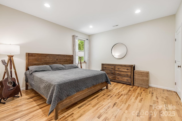 506 Hiawassee Ave, Black Mountain, NC 28711 - bedroom with wood finished floors, recessed lighting, and baseboards