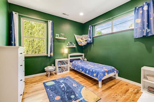 506 Hiawassee Ave, Black Mountain, NC 28711 - bedroom with wood finished floors, baseboards, and recessed lighting