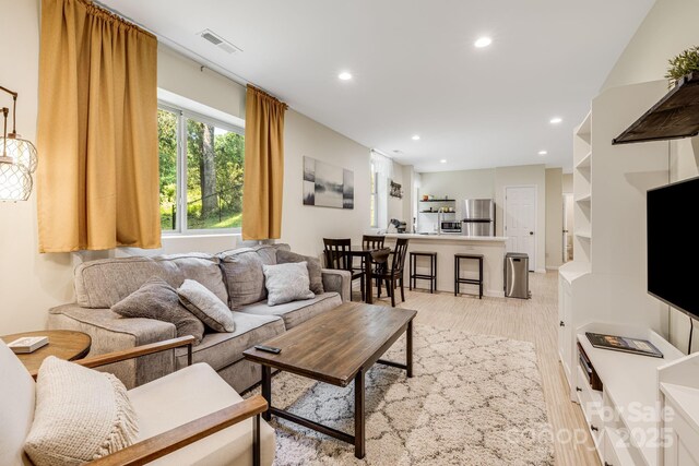 506 Hiawassee Ave, Black Mountain, NC 28711 - living room featuring light wood-type flooring and recessed lighting
