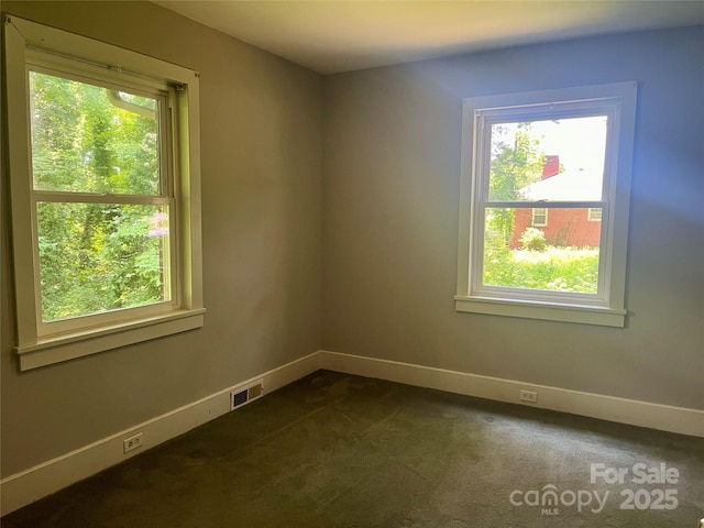 117 Silvercreek Rd, Morganton, NC 28655 - spare room featuring plenty of natural light and baseboards