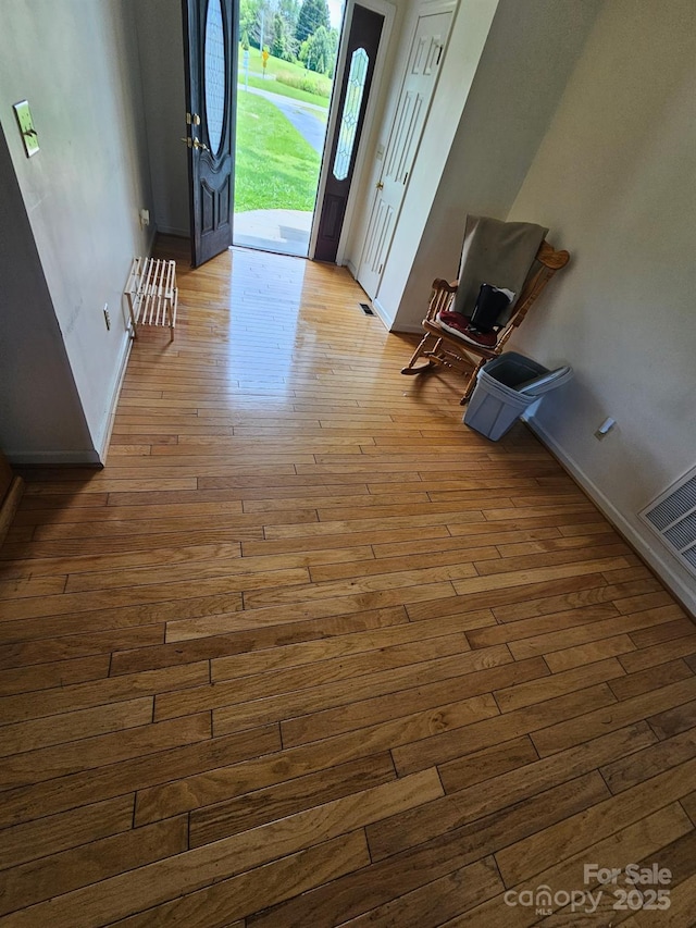 1670 Jamestown Rd, Morganton, NC 28655 - entryway featuring hardwood / wood-style floors and baseboards
