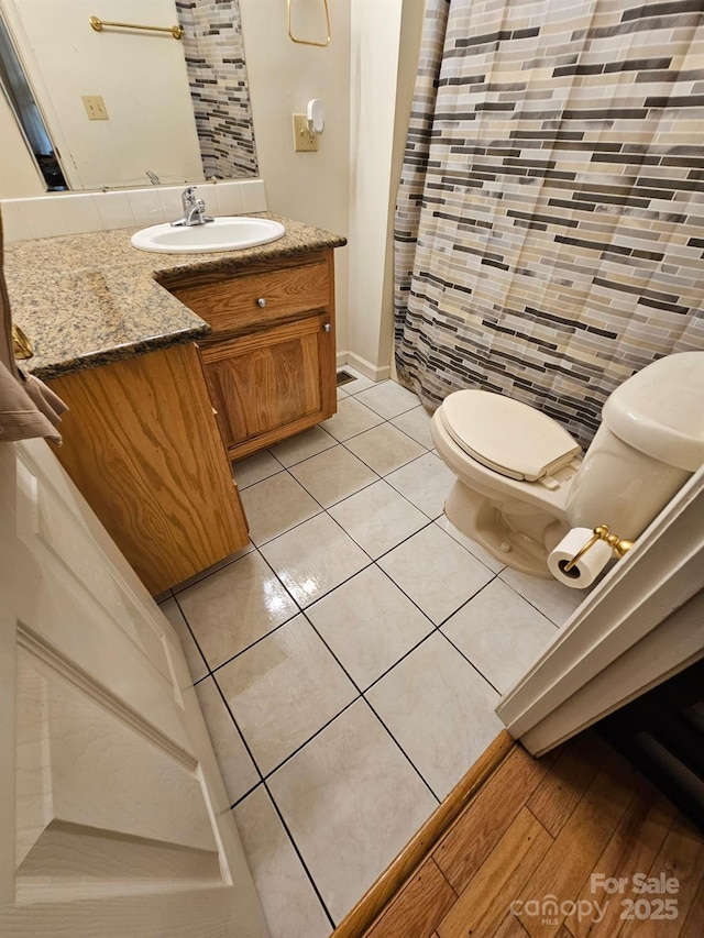 1670 Jamestown Rd, Morganton, NC 28655 - bathroom featuring vanity, tile patterned flooring, and tile walls