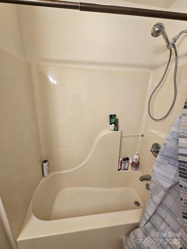 1670 Jamestown Rd, Morganton, NC 28655 - bathroom featuring shower / bath combination with curtain