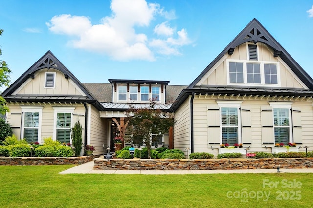 5357 Pembrey Dr, Denver, NC 28037 - craftsman-style house featuring board and batten siding, a front yard, and a standing seam roof