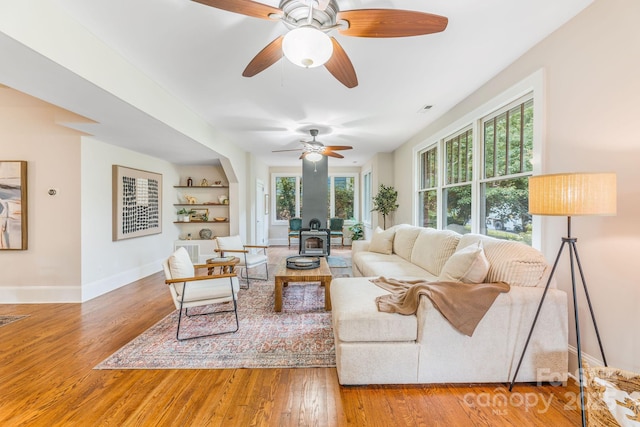 24 Warwick Rd, Asheville, NC 28803 - living area with wood finished floors, baseboards, built in features, and a ceiling fan
