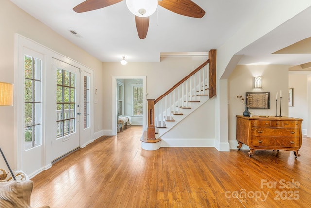 24 Warwick Rd, Asheville, NC 28803 - entryway featuring stairway, wood-type flooring, baseboards, and ceiling fan
