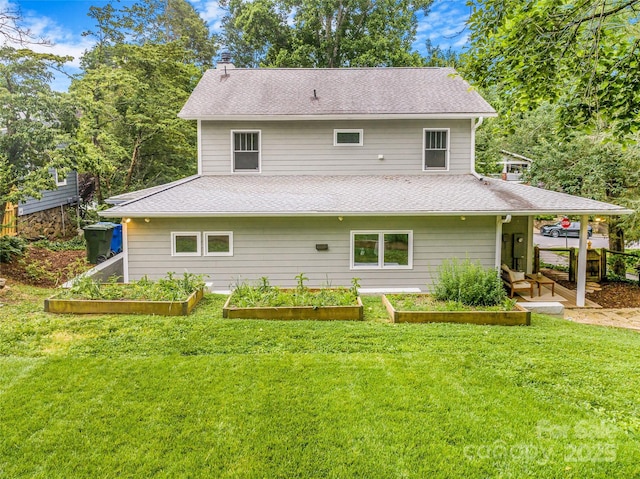 24 Warwick Rd, Asheville, NC 28803 - rear view of house with a garden, a lawn, and roof with shingles