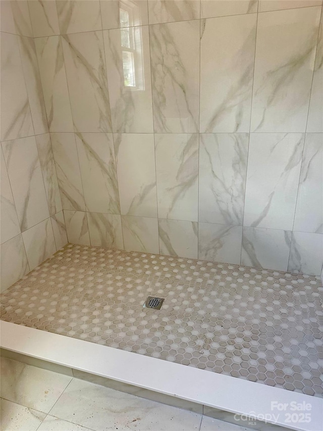 63 Cornerstone Dr, Taylorsville, NC 28681 - bathroom featuring a tile shower