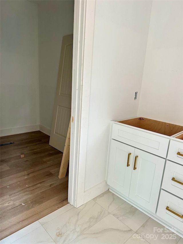 63 Cornerstone Dr, Taylorsville, NC 28681 - bathroom with baseboards and wood finished floors