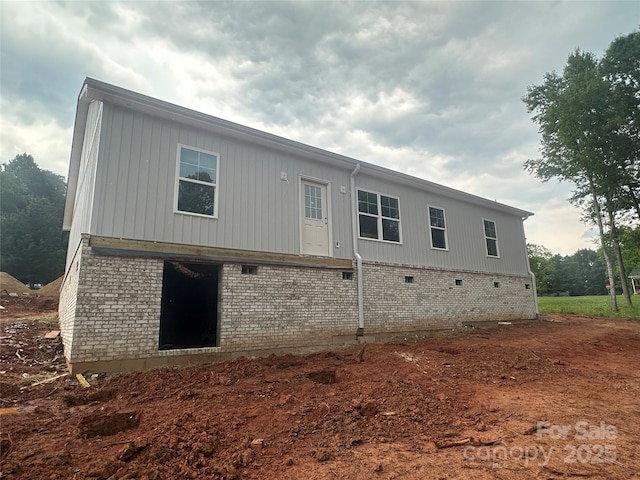 63 Cornerstone Dr, Taylorsville, NC 28681 - rear view of house with brick siding