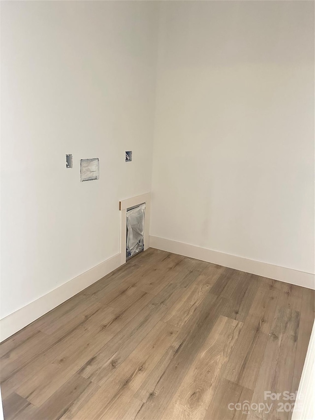 63 Cornerstone Dr, Taylorsville, NC 28681 - laundry room with light wood-style flooring and baseboards