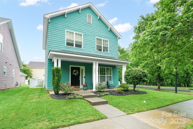 7931 Baylis Dr, Huntersville, NC 28078 - view of front of house featuring a porch and a front yard