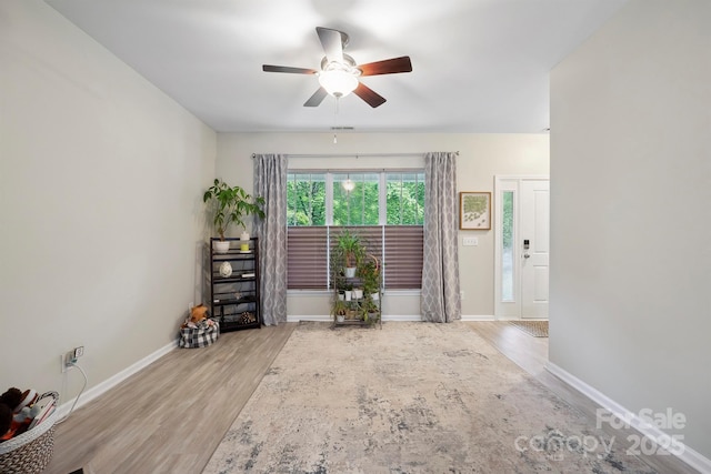 7931 Baylis Dr, Huntersville, NC 28078 - unfurnished room featuring ceiling fan, wood finished floors, and baseboards