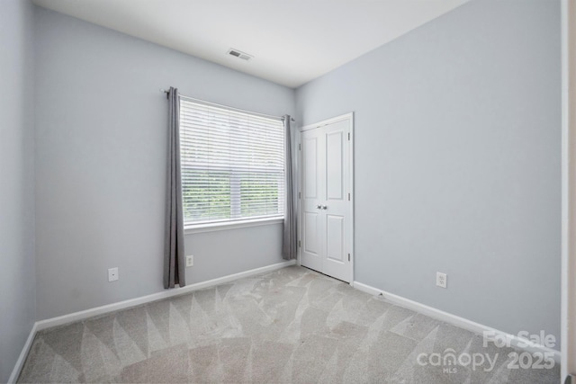 7931 Baylis Dr, Huntersville, NC 28078 - carpeted empty room featuring baseboards