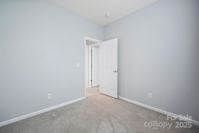 7931 Baylis Dr, Huntersville, NC 28078 - spare room featuring carpet flooring, baseboards, and a smoke detector
