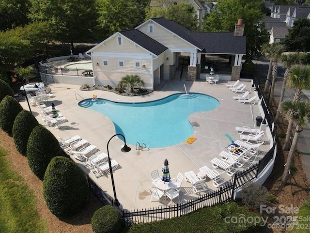 7931 Baylis Dr, Huntersville, NC 28078 - community pool with a patio