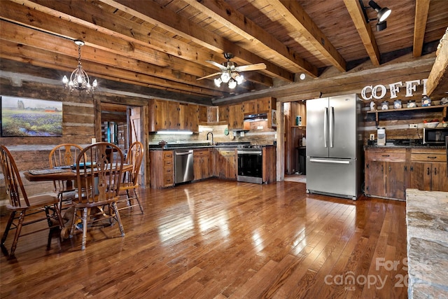 1495 El Miner Dr, Mars Hill, NC 28754 - kitchen featuring stainless steel appliances, wood ceiling with exposed beams, dark countertops, dark wood-type flooring, and brown cabinets