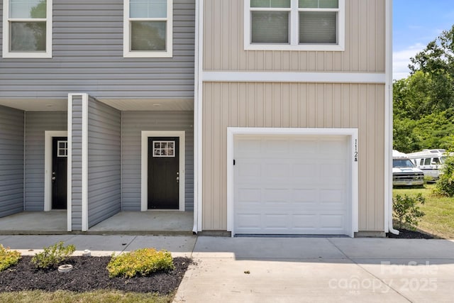 1112 Angle St, Cherryville, NC 28021 - view of exterior entry with an attached garage and driveway