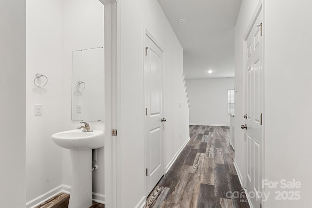 1112 Angle St, Cherryville, NC 28021 - bathroom featuring wood finished floors, baseboards, and a sink