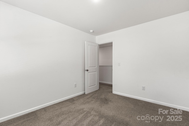 1112 Angle St, Cherryville, NC 28021 - carpeted empty room featuring baseboards and a smoke detector