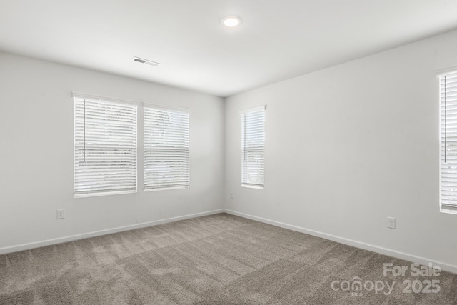 1112 Angle St, Cherryville, NC 28021 - carpeted empty room with baseboards and healthy amount of natural light